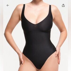 Skims sculpting thong bodysuit in black